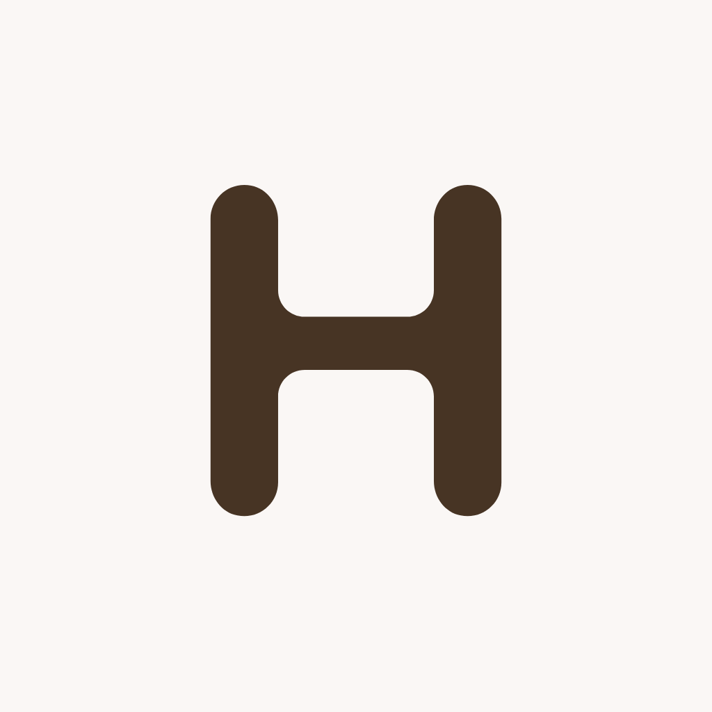 The H mark in ink on a paper square